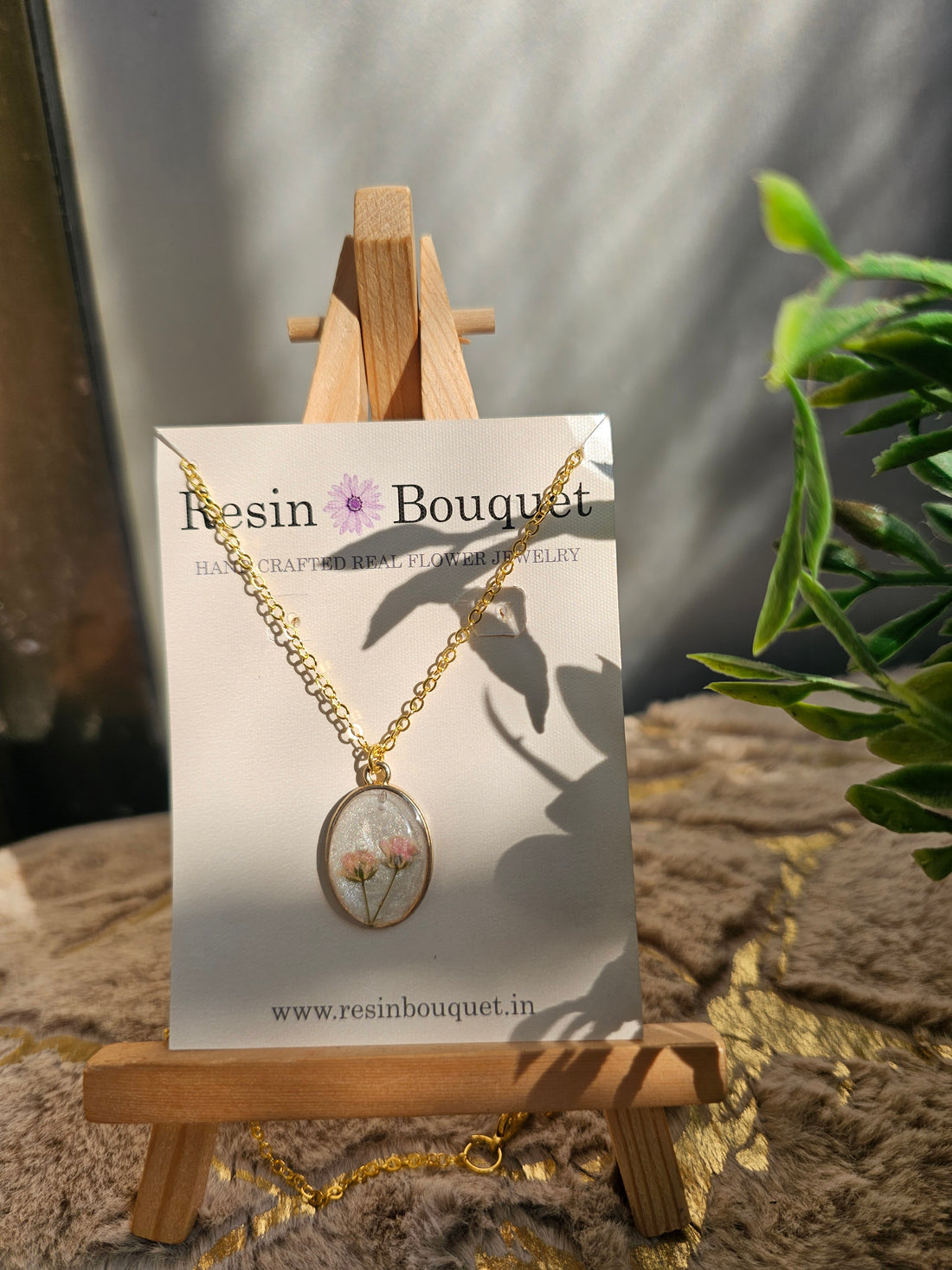 Oval Baby’s Breath Pink Flower Pendant – A Soft Symbol of Love and Grace